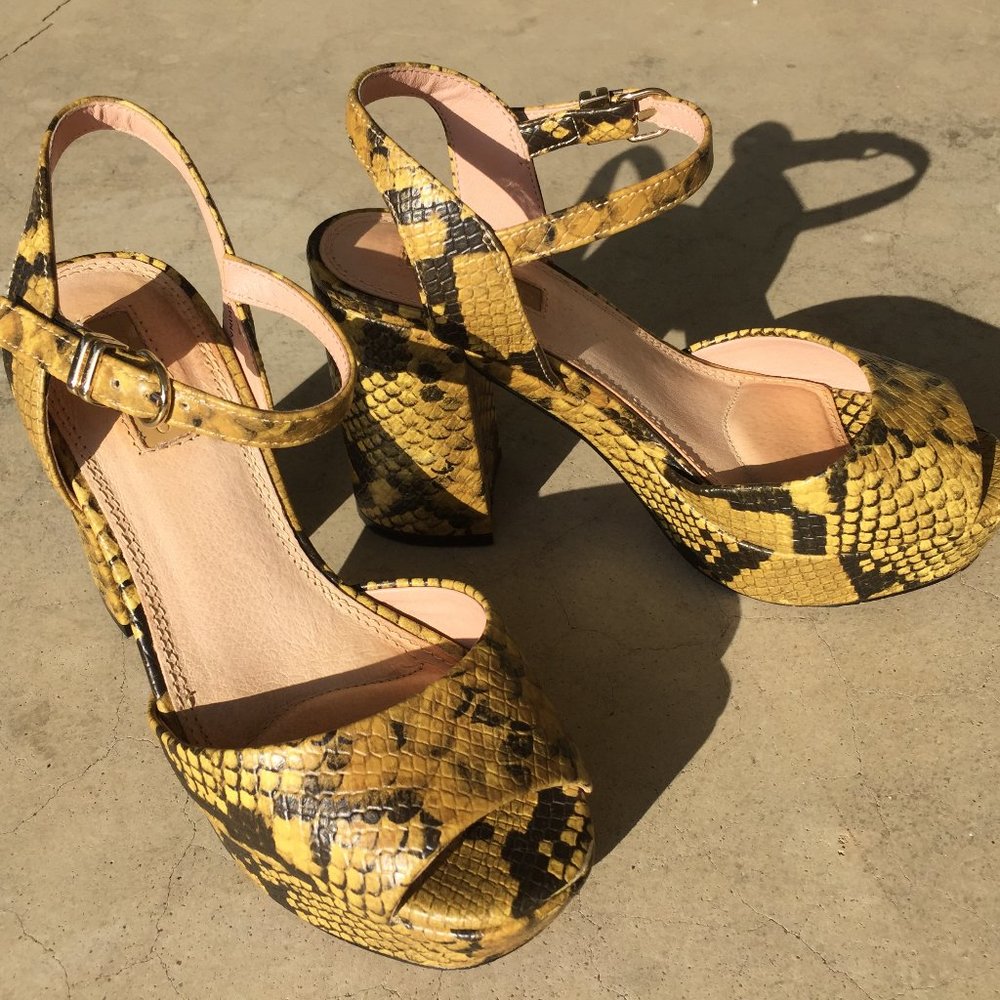 Snake print sandals.